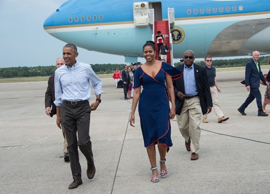 Barack and Michelle Obama in Tory Burch on the way to Matha's vineyard